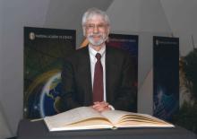 Dr. Donald K. Grayson after signing the member registry during his induction to the National Academy of Sciences in 2014.