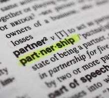 photo of dictionary page showing definition of 'partnership'