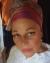 color headshot of Rachel Chapman with head wrap