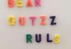 "Bear Gutzz Rule" written in fridge magnets