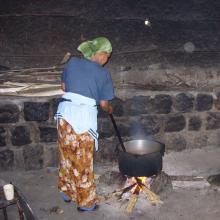 Hospital staff member cooking food in a rural hospital, Ethiopia
